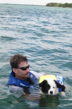 Jake swims in the lake with Dad Bobby