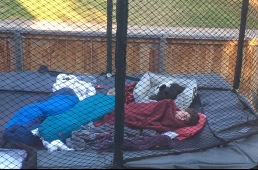 Aspen sleeping out on trampoline
