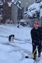Jax helps dad shovel