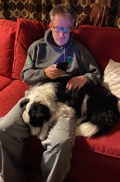 Maisie in dad's lap